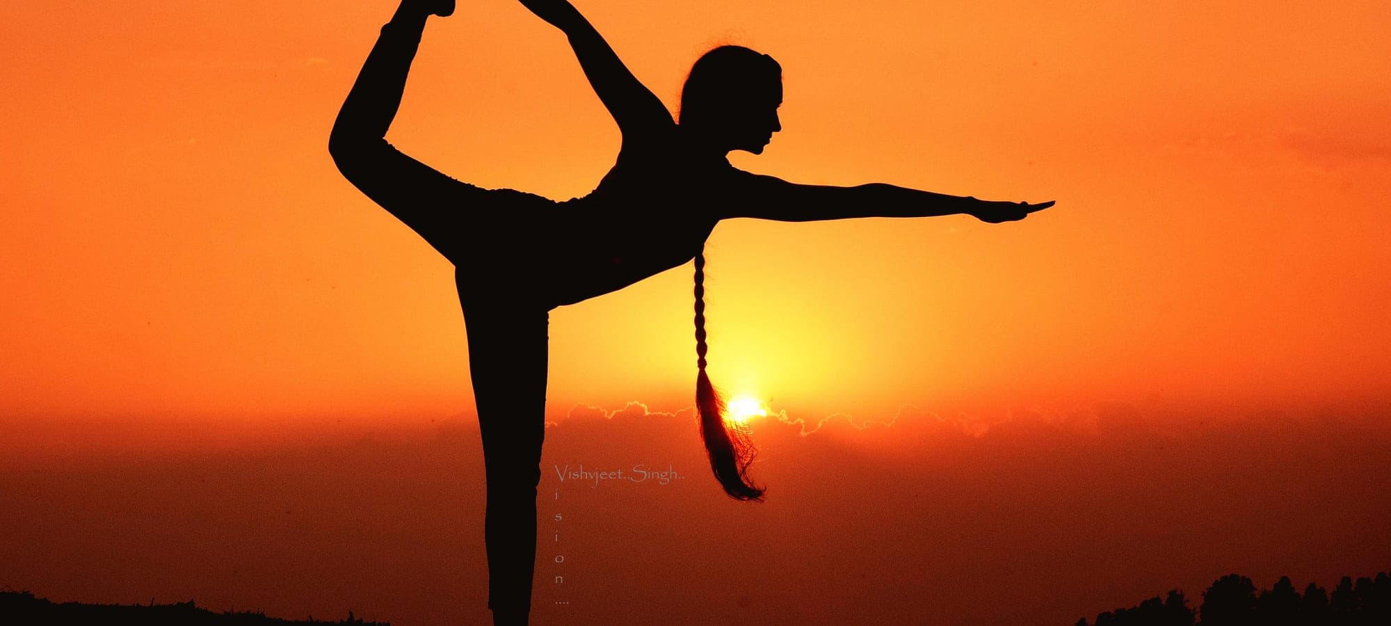 Odissi dancer silhouette at sunset